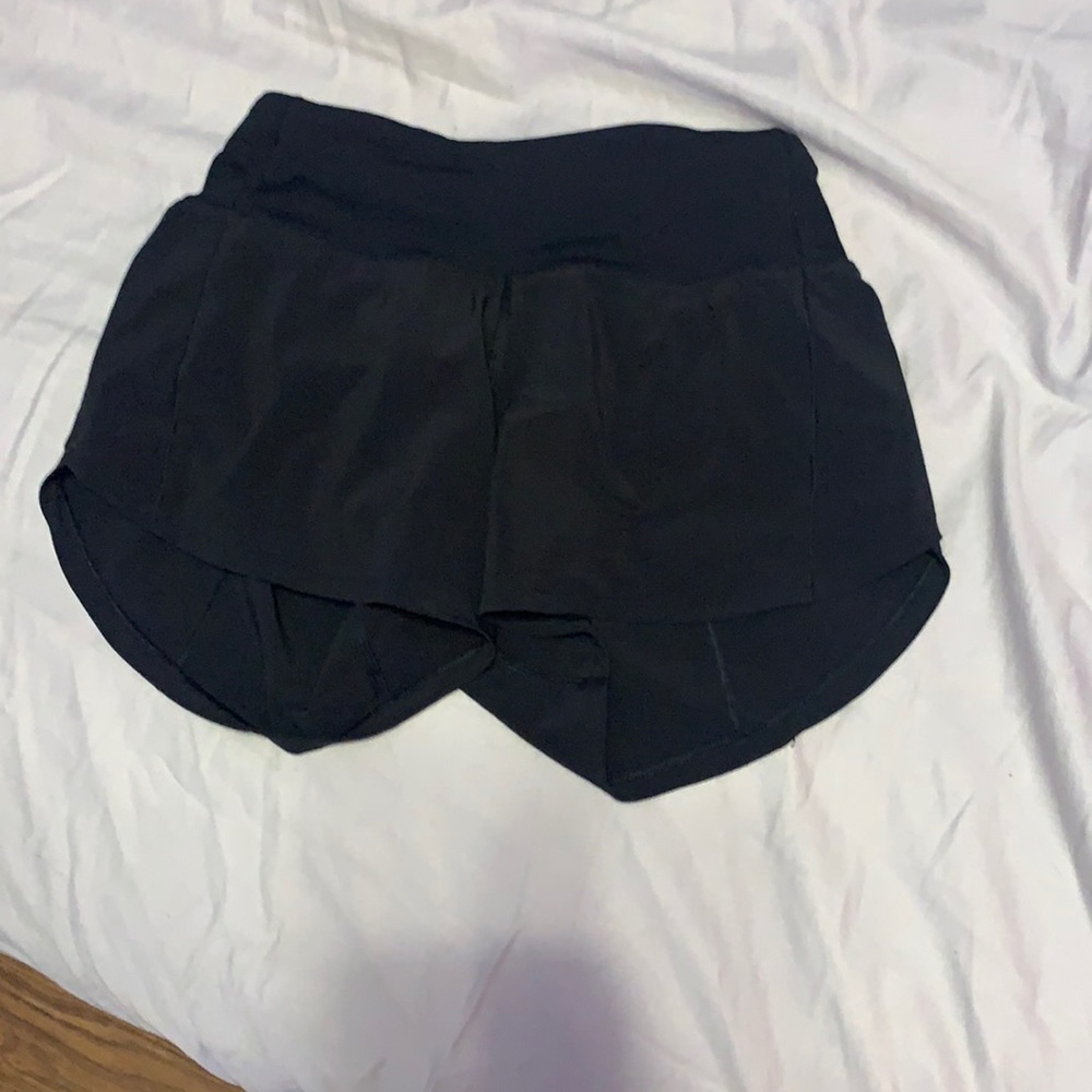 Lululemon black speed ups size 0.